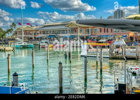 Tour boats docked at the marina located at The Bayfront Marketplace on Biscayne Bay in Miami, Florida. Stock Photo