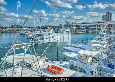 Tour boat leaving the marina located at The Bayfront Marketplace on Biscayne Bay in Miami, Florida. Stock Photo