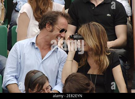 Actor Vincent Lindon and his girlfriend Caroline attend the Men Semi-Finals of the French Open at Roland Garros in Paris, France on June 8, 2007. Photo by ABACAPRESS.COM Stock Photo