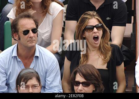 Actor Vincent Lindon and his girlfriend Caroline attend the Men Semi-Finals of the French Open at Roland Garros in Paris, France on June 8, 2007. Photo by ABACAPRESS.COM Stock Photo