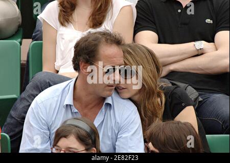 Actor Vincent Lindon and his girlfriend Caroline attend the Men Semi-Finals of the French Open at Roland Garros in Paris, France on June 8, 2007. Photo by ABACAPRESS.COM Stock Photo