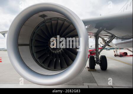 GERMANY, Hamburg airport , trial phase with biofuel , Lufthansa jet Airbus A321 , one turbine is powered with 50 percent biofuel a blend of Jatropha , Camelina oil and animal grease , aircraft engine , round circle eco kerosine Stock Photo