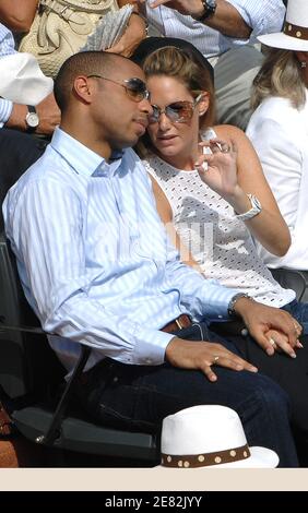 French football player Thierry Henry and his wife Nicole attend