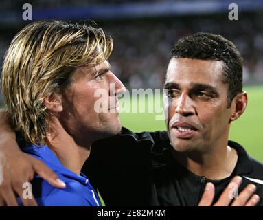 Lyon's goalkeeper Gregory Coupet with Sonny Anderson during his testimonial match in the Gerland stadium in Lyon, France on June 11, 2007. Photo by Vincent Dargent/Cameleon/ABACAPRESS.COM Stock Photo