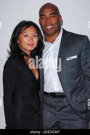 Athlete Tiki Barber and his wife Ginny attend the premiere of A