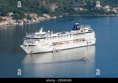 Kotor, Montenegro - July 18, 2013: high view MSC Armonia cruise ship anchored in the Kotor Bay. The MS MSC Armonia cruise ship was built in 2001 as MS Stock Photo