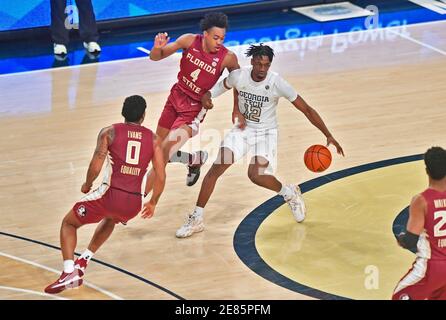 Atlanta, GA, USA. 30th Jan, 2021. Georgia Tech forward Khalid Moore (12) is pressured by Florida State forward Patrick Williams (4) during the second half of an NCAA college basketball game at McCamish Pavilion in Atlanta, GA. Austin McAfee/CSM/Alamy Live News Stock Photo