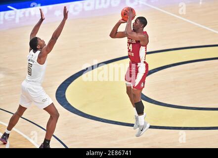 Atlanta, GA, USA. 30th Jan, 2021. Florida State guard Devin Vassell (24) attempts a shot over a Georgia Tech defender during the first half of an NCAA college basketball game at McCamish Pavilion in Atlanta, GA. Austin McAfee/CSM/Alamy Live News Stock Photo