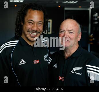 All Black captain Tana Umaga (L) with coach Graham Henry announces his retirement from international rugby at a press conference at the New Zealand Rugby Union headquarters in Wellington January 10, 2006. The 74 test veteran will continue to play Super 14 rugby for the Hurricanes and his provincial team. REUTERS/Anthony Phelps
