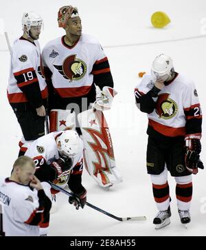 Ottawa Senators players Jason Spezza (19) and Mike Comrie (89 