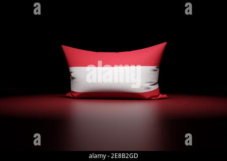 3d illustration of rectangular pillow depicting the national flag of Austria under red light on black isolated background Stock Photo