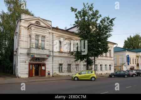 Kostroma, Russia - August 11, 2020: View of an old residential building on Tchaikovsky Street on a summer evening. Gold ring of Russia Stock Photo