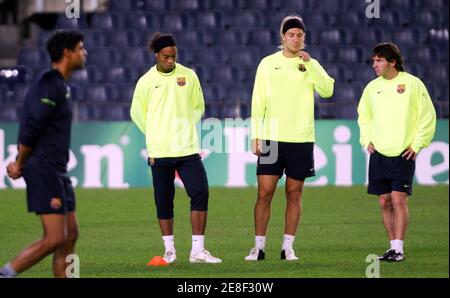 Barcelona S Brazilian Soccer Player Ronaldinho 2nd L And Argentinians Maxi Lopez 2nd R And Leo Messi R Listen To Their Coach Frank Rijkaard During A Training Session At Nou Camp Stadium In Barcelona Spain November 1 2005 Barcelona And