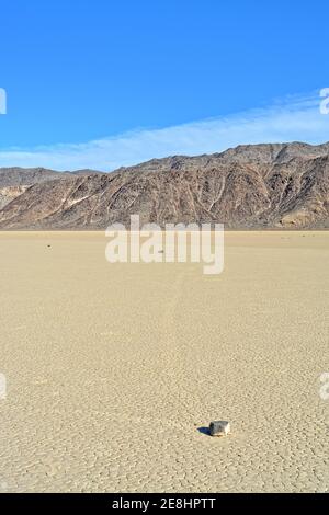 sailing rock leaving a long trail in the desert of the Racetrack Playa ...