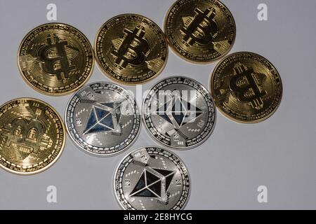 many bitcoins and ether coins from cryptocurrency view from above Stock Photo