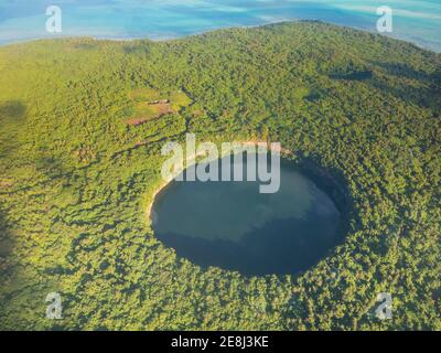Aerial of Lalolalo lake volcanic crater lake, center of Wallis, Wallis and Futuna Stock Photo