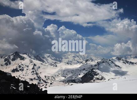 View of the ever-snow-covered mountains from Elbrus. Stock Photo