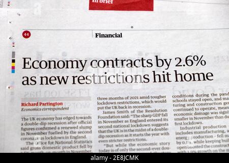 'Economy contracts by 2.6% as new restrictions hit home' Guardian news coronavirus covid 19 newspaper headline 15 January 2021 London UK Stock Photo