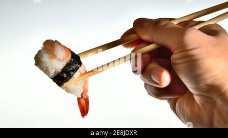 Ebi nigiri sushi with shrimp cooked in bamboo sticks Stock Photo