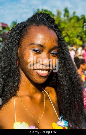 Girl posing at the Carneval in the town of Sao Tome, Sao Tome and