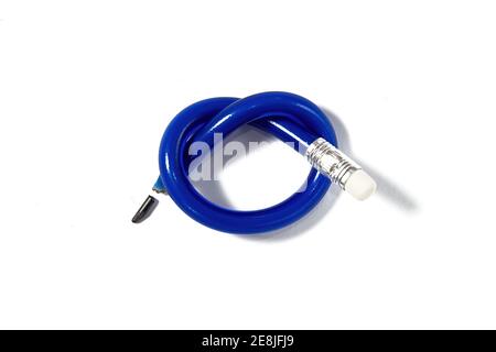 Isolated knotted broken pencil on the white paper. Office supply and stationery Stock Photo