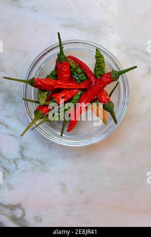 Dried peppers ( Capsicum frutescens) , pepperoni, chillies, chillies, chilli pepper, chili, cayenne, cayenne pepper, piri-piri, tabasco, peperoncini Stock Photo