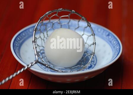 Boiled Glutinous Rice Balls in Fermented Glutinous Rice Stock Photo - Alamy