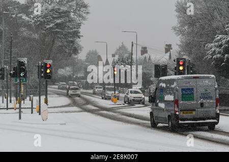 vehicles travelling after heavy snowfall Stock Photo