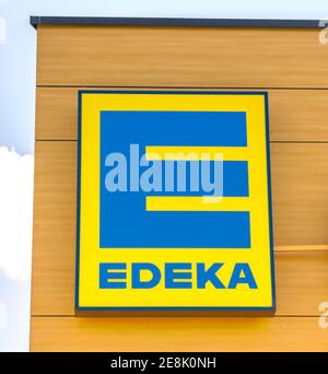 Schwabach, Germany : EDEKA sign at branch. The Edeka Group is the largest German supermarket corporation. Stock Photo