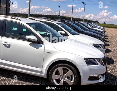 Furth, Germany : Skoda logo on a car dealer in Bavaria. Skoda is a Czech automobile manufacturer founded in 1895 as Laurin and Klement. Stock Photo