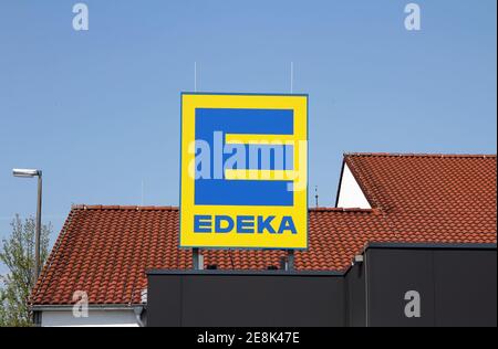 Ansbach, GERMANY : EDEKA sign at branch. The Edeka Group is the largest German supermarket corporation. Stock Photo