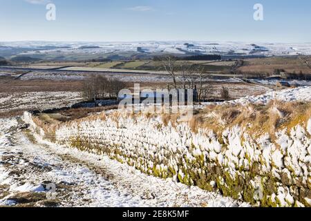 A snowy winter's day on Hadrian's Wall at Peel Gap, near the Steel Rigg car park, in Northumberland, UK Stock Photo