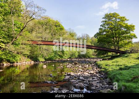 The Hadrian's Wall Path crosses the River Irthing at Willowford, near Gilsland, on the Cumbria / Northumberland border Stock Photo