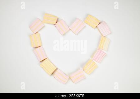 candy marshmallow heart shape with empty center. sweet backdrop for holiday events. pastel colors Stock Photo
