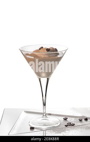 coffee ice cream in martini glass with roasted beans in ceramic tray isolated on white, copy space Stock Photo