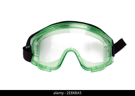 green safety glasses isolated on a white background. industrial protective wear Stock Photo