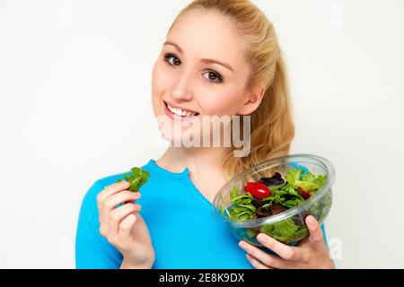 Woman holding salad Stock Photo