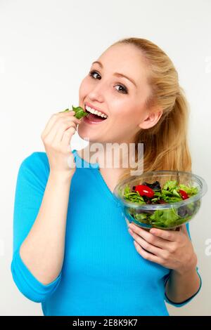 Woman holding salad Stock Photo