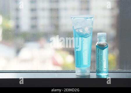 Blue Alcohol gel tube and bottle for Hand wash with copy space - Hygiene Concept Stock Photo