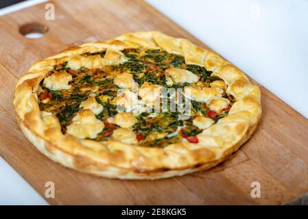 Vegetable Tart, puff pastry, chard, carrot, onion, garlic and red peppers. Stock Photo