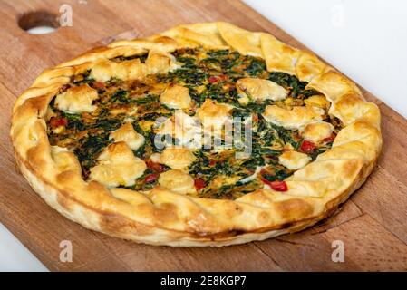 Vegetable Tart, puff pastry, chard, carrot, onion, garlic and red peppers. Stock Photo