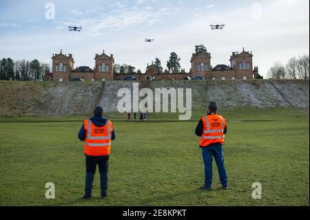 Hamilton, Scotland, UK. 31st Jan, 2021. Pictured: Professional drone pilots flying their drones seen in Chatelherault Country Park as others take in exercise as the temperature stays just above freezing. The sun is out and people are enjoying themselves during the coronavirus phase 4 lockdown. Credit: Colin Fisher/Alamy Live News Stock Photo