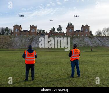 Hamilton, Scotland, UK. 31st Jan, 2021. Pictured: Professional drone pilots flying their drones seen in Chatelherault Country Park as others take in exercise as the temperature stays just above freezing. The sun is out and people are enjoying themselves during the coronavirus phase 4 lockdown. Credit: Colin Fisher/Alamy Live News Stock Photo