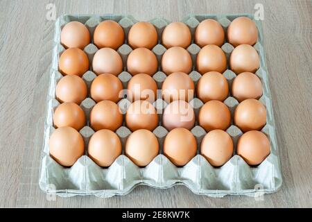 View from above on a box with 30 fresh eggs Stock Photo