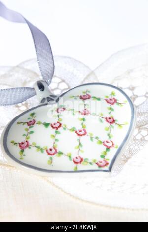 Vintage Bavarian handmade porcelain heart pendant Stock Photo