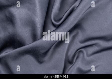 wavy rippled gray blue purple silk satin fabric background Stock Photo