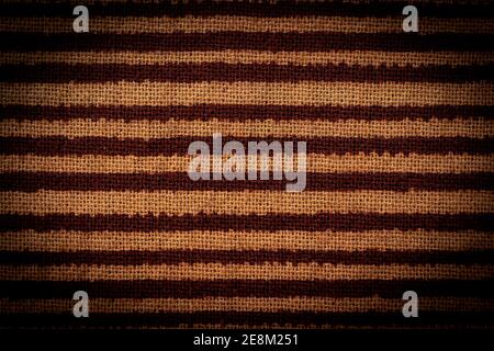 Dark brown fabric with linear stripes texture background, Brown fabric with a straight line pattern. with high resolution. Stock Photo