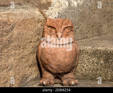 Decorative Owl is on display in front of a house Stock Photo
