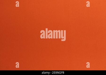 Close up Mottled orange paper background and texture. Orange paper with stripes of paper. Stock Photo