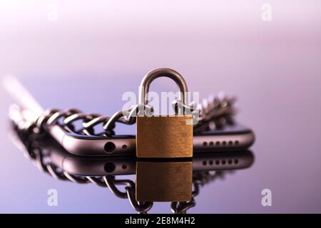 Modern smartphone with a lock. Data protection. Mobile phone security concept. Stock Photo